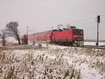Eine Baureihe 112 mit dem RE 7 auf den Weg in Richtung K�ln Hier in Neuss Allerheiligen am 03.01.10