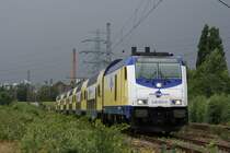 246 002-0 mit einem Metronom nach Hamburg Hbf in Hamburg Unterelbe am 09.07.2009