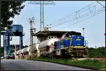 V 2304 als  Zementbomber  aus Mukran, verlsst gerade die Ziegelgrabenbrcke.    Stralsund am 29.07.09 