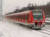 422 048 erreicht als Vollzug den Haltepunkt Bochum-Ehrenfeld auf der S1 in Richtung Dortmund am 10.01.2010.