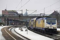 146 535-0 legt sich am 23.01.10 bei der Ausfahrt mit ihrem ME aus Hamburg-Harburg nach L�neburg in eine leichte Linkskurve.