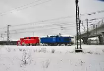 PRESS 203 011 schiebt ihren Schneepflug aus dem Bf Stralsund Richtung Grimmen am 03.02.2010