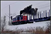 Rauchzeichen �ber Stralsund. 202 264-8 der -WFL- auf dem R�gendamm. 
Stralsund am 11.02.10