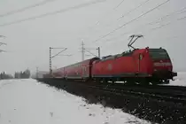 146 118 mit RE von Mannheim Hbf nach Frankfurt(Main)Hbf als Schublok.Am 14.02.10 in Lampertheim.