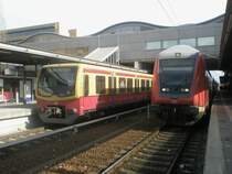 Hier links eine S7 nach Ahrensfelde und rechts ein RE1 von Eisenh�ttenstadt nach Magdeburg Hbf., diese beiden Z�ge standen am 27.2.2010 in Potsdam Hbf.