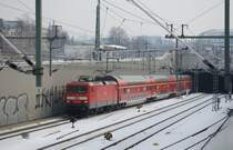 09.02.2010 114 031-8 mit RE4 nach Wismar unterwegs beim Verlassen des Nord-S�d Tunnels in Berlin.