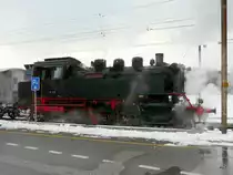 Verein Historisches Emmental - DB Dampflok 64 518 beim Wasser fassen unterwegs auf der Linie zwischen Burgdorf und Solothurn 30.01.2010