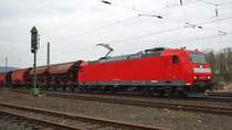 185 154-2, eigentlich  nur  eine DB-rote Lok, auff�llig ist jedoch, dass sie nahezu blanko daherkommt. Aufgenommen am 12.03.2010 in Eschwege West.