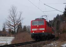 111 053-5 ist mit RB 5432 auf dem Weg nach Mittenwald, kurz vor dem �berqueren der Loisach und dem Ort Eschenlohe. 13.3.2010