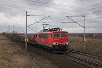 155 035-9 kommt mit einem Leerzug Autotransportwagen aus Richtung Braunschweig. Fotografiert am 14.03.2010 am Stadtrand von Magdeburg. 