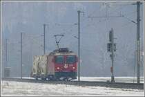 Ge 4/4 II 628  S-chanf  mit kurzem G�terzug beim Einfahrsignal von Malans. (11.03.2010)