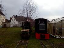 Feldbahn bei besonderem Himmel.Die schwarze Feldbahndiesellok macht an diesem Tag betrieb auf der  Garten-Strecke .