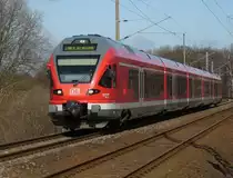RE 33314 Binz-Stralsund unterwegs am 21.M�rz 2010 zwischen Lietzow und Bergen/R�gen.Noch ist mein Fotostandpunkt frei vom Gestr�pp in wenigen Wochen mu� ich mich dann wieder durch Dornenhecken und Kletten k�mpfen um zu meinen Fotopunkt zu gelangen.