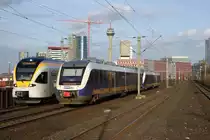 Eurobahn ET 7.03 als RE 13 nach M�nchengladbach und NWB VT 575 als RE 10 nach D�sseldorf Hbf treffen sich in D�sseldorf-Hamm am 27.02.2010 um 16:53 Uhr 