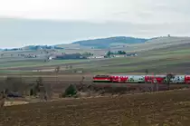In den fr�hen Morgenstunden schiebt die BR 1142 den REX 1617 nach Wien Westbahnhof. Neulengbach, am 21.03.2010.