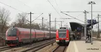 Links der RJ 67 M�nchen Hbf - Budapest Keleti-pu und rechts 423 864-8 als S4 nach Ebersberg. Aufgenommen am 20.03.10 beim BB-Treffen in M�nchen auf dem Bahnhof Trudering.