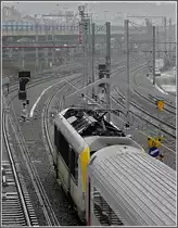Im str�menden Regen verl�sst die 1341 mit dem IC A Eupen-Oostende am 28.03.10 den Bahnhof Li�ge Guillemins. (Jeanny)