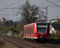 425 577-4 als RB11063 nach Aachen am Km 28.8 kurz vor Geilenkirchen, 18.4.10