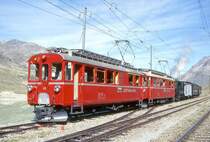 RhB Dampf-Extrazug mit Triebwagenvorspann f�r GRUB�NDEN TOURS 3413 von Pontresina nach Ospizio Bernina am 26.08.2000 in Ospizio Bernina mit Triebwagen und Dampflok ABe 4/4I 34 - ABe 4/4I 30 - G 3/4 1 - Xk 9398 - B� 2060 C� 2012. Hinweis: Triebwagen noch in roter Lackierung!
