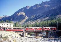 RhB Schnellzug 417 von St.Moritz nach Tirano am 26.08.2000 Ausfahrt Morteratsch auf Berninabach-Br�cke mit TRIEBWAGEN ABe 4/4II 41 - ABe 4/4II 44 - A 1272 - BD 2473 - ...
