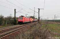185 149-2 mit Schweiz-Paket und Containerzug auf der Fahrt gen Misburg (Ahlten 08.04.10)
