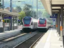 SBB - Bahnhof Dornach-Arlesheim  Durchfahrender ICN Mani Matter und Ausfahrender Triebzug RABe 521 018-2 am 29.04.2010