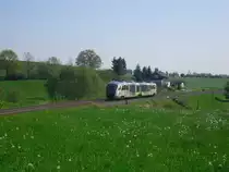 VT04 der Vogtlandbahn ist am 22.05.10 auf dem Weg nach Zwickau/Sachs. Hier aufgenommen in Limbach/V.