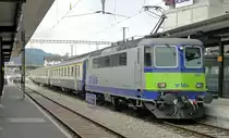 An Stellte eines EWIII Pendels, steht am 11.06.10 dieser Oldtimer mit der Re 420 505-0 im RE-Dienst Bern-Luzern. (aufgenommen in Sch�pfheim)