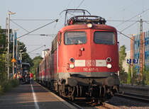 110 497-5 mit der RE4 (11598) aus D�sseldorf nach Aachen bei der Ausfahrt in Geilenkirchen, 11.6.10