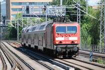 BERLIN, 16.06.2010, 143 642-7 als RB14 nach Nauen auf Vorbeifahrt am S-Bahnhof Bellevue


