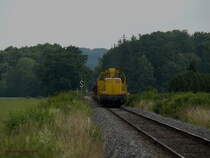 In Magny-Vernois bei Lure ist hier ein Materialzug fr die Hochgeschwindigkeitsneubaustrecke LGV-Rhin-Rhne auf der eigens dafr wieder in Betrieb genommene Strecke von Lure nach Villersexel unterwegs.
Aufgrund der starken Steigungen wird der Zug mit Vierfachtraktion gefahren.
Vorne ziehen die beiden SNCF-Infra-Loks BB69260+BB69309 und hinten schieben hier die beiden BB69297+BB69264. 
21.06.2010 Magny-Vernois (bei Lure)
