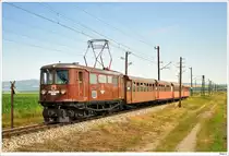 1099.10 mit dem Panoramic 760 alias R19259 von St.P�lten Hbf nach Mariazell. Hier bei Ebersdorf b. Obergrafendorf, 4.7.2010.