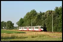 Mit Schwung nimmt am 19. Juli 2010 ein Zugverband, angef�hrt von 4103, Kurs auf die Unterf�hrung zwischen dem Haltepunkt Hohensachsen und dem Bahnhof Whm-L�tzelsachsen OEG.