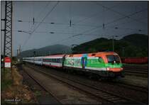 Weltuntergangsstimmung in Knittelfeld als die 1116 007 SOS-Kinderdorf mit dem EC 103 in den Bahnhof einfhrt. 29.07.2010