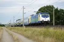 146 535-0  Rizzi Lok  zieht den ersten metronom Sonderzug Berlin 2010 mit vielen Berlin Besucher wieder in die Heimat zur�ck. Zwischen Gro�wudicke und Rathenow. 07.08.2010