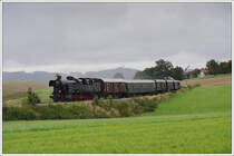 �GEG 78.618 (Schiebe 77.28) mit dem Fotozug Z 91153 von Attnang-Puchheim nach Hausruck am 6.8.2010 kurz nach dem Bahnhof Eberschwang aufgenommen.