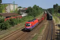 1116 019 im M�V Cargo-Outfit mit G�terzug stadteinw�rts. Er durchf�hrt den Bahnhof Pestszentlőrinc.