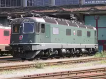 Eine der letzten gr�nen Re6/6, die 11646  Bussigny  , steht am 10.08.2010 abgestellt vor dem Depot Erstfeld, wo sie auf ihren nachmitt�glichen Einsatz vor einem  St�cker  nach RBL wartet.