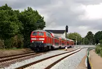 218 413-3 f�hrt mit einem RE nach Kiel Hbf am 20.06.2010 aus dem Bahnhof von Pl�n aus.