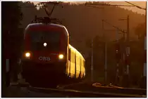 Gegenlichtaufnahme vom ex Russland Taurus 1116 084 welcher mit EC 530  �sterreichische Computer Gesellschaft  von Lienz nach Wien Meidling f�hrt. 
St.Lorenzen 19.08.2010