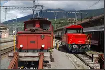 Alt und Neu nebeneinander: ungef�hr 70 Jahre liegen zwischen dem Baujahr der Ee 3/3 16371 (links) und dem der neue Ee 922 011-3; Brig, 29. Juli 2010.