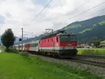 1144 223 mit REX 1511 W�rgl Hauptbahnhof-Salzburg Hauptbahnhof bei Brixen im Thale am 11-8-2010.