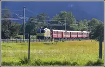 RE1261 mit Ge 4/4 II 611  Landquart  zwischen Landquart und Malans. (01.09.2010)