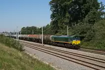 DE63 mit einem Kesselwagenzug am 06.09.2010 bei R�hrmoos.