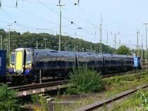 Am Wochenende stand dieser f�r die Scotrail bestimmte, funkelnagelneue Triebwagen in Aachen-West. Zwei speziell f�r diesen Triebzug bereitgestellte Wachm�nner sorgten daf�r, dass nicht schon vor der Auslieferung Sprayer ihr sch�ndliches Werk tun konnten. Aufgenommen am 11/09/2010.