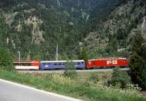 MGB exFO 1.Klasse-PANORAMA-GLACIE-EXPRESS B 902 von Zermatt nach St.Moritz am 24.05.1997 bei Grengiols Einfahrt Zahnstange mit E-Lok HGe 4/4II 107 - RhB WR 3811 - AS 4023 - BVZ AS 2011- AS 4027 - AS 4022.
