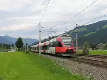 4024 085-5 mit S6 5015 W�rgl Hauptbahnhof-Hochfilzen bei Brixen im Thale am 11-8-2010.
