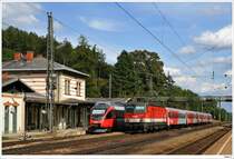 Plandienst auf der Westbahn: 1144.283 passiert gerade mit dem REX1624 den Bhf. Rekawinkel wo gerade 4024.100 steht; 18.9.2010.