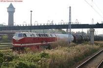 119 158 in Wustermark (alias Elstal) am 14.10.2005 mit einem G�terzug. 119 158 brachte den G�terzug nach Wustermark und fuhr dann an die Tankstelle zum tanken.