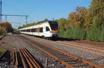 Ein f�nfteiliger Flirt der Eurobahn ist hier bei der Durchfahrt in Korschenbroich am 9 Oktober 2010 zu sehen. Es ist der ET 7.06 der hier nach Hamm eilt.